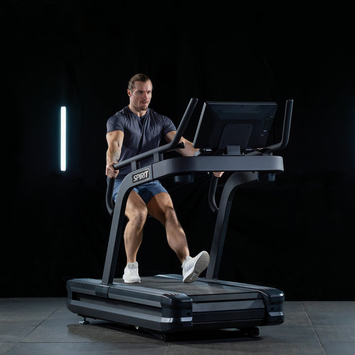 SPIRIT Fitness CTSBS900 commercial slat belt sled treadmill with curved handrails, LED console and vulcanized rubber slat running surface