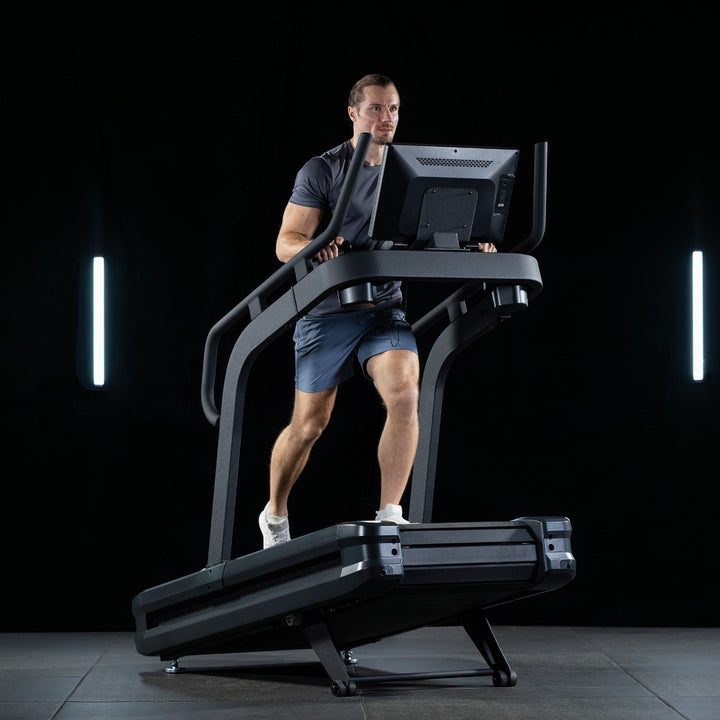 SPIRIT Fitness CTSBS900 commercial slat belt sled treadmill with curved handrails, LED console and vulcanized rubber slat running surface