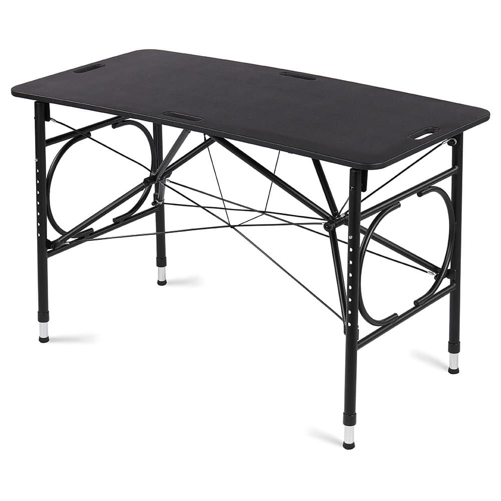Hausmann portable taping table with aluminum frame, carbon fiber top, adjustable height, and removable turf pads for athletic training and sideline treatment